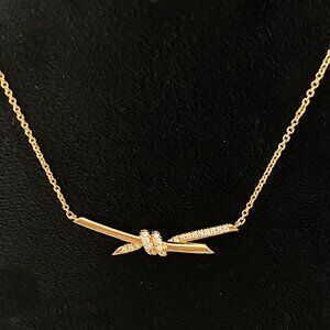 Tiffany & Cos Signature Rose Gold Bow Necklace Partially Encrusted With Diamo